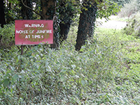 A photo of a gunfire warning notice.